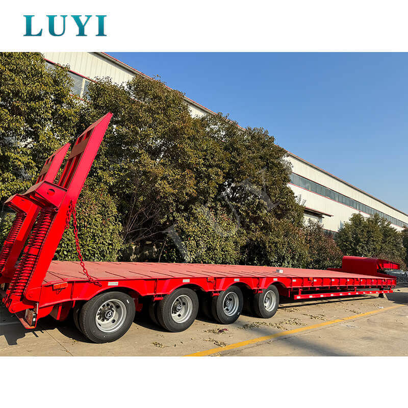 Fabryka Lu Yi wita znamienitych gości z Kamerunu! Czteroosiowe naczepy niskopodwoziowe zabezpieczają zamówienia zagraniczne